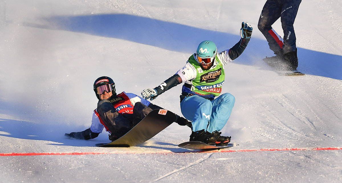 Lucas Egibar (eskuinean) eta Alessandro Haemmerle, Munduko Snowboard Txapelketan, iazko otsailaren 11n. Justugatik irabazi zuen Egibarrek. ANDERS WIKLUND / EFE