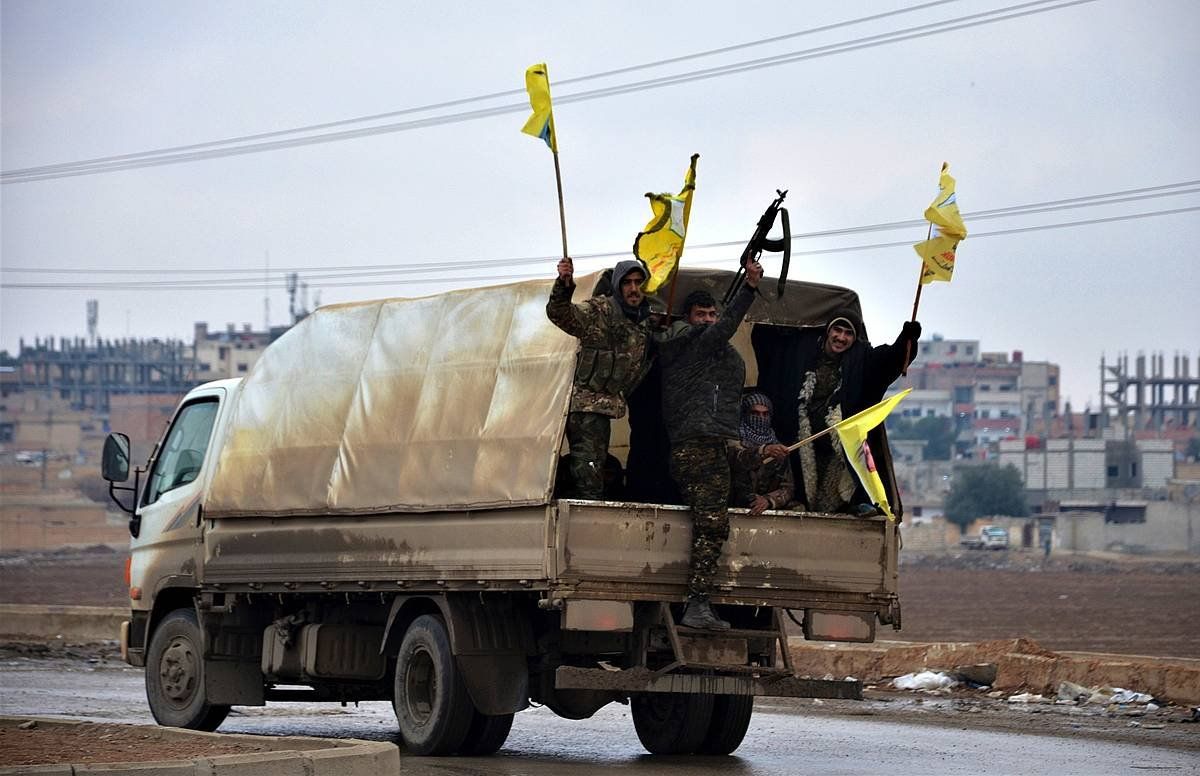 SDFren miliziano batzuk, Al-Hasakahn (Rojava), iragan urtarrilean. AHMED MARDNLI / EFE