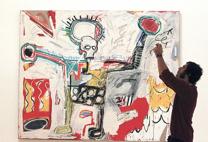 Basquiaten ehun bat lan bildu dituzte erakusketan. LUIS TEJIDO / EFE