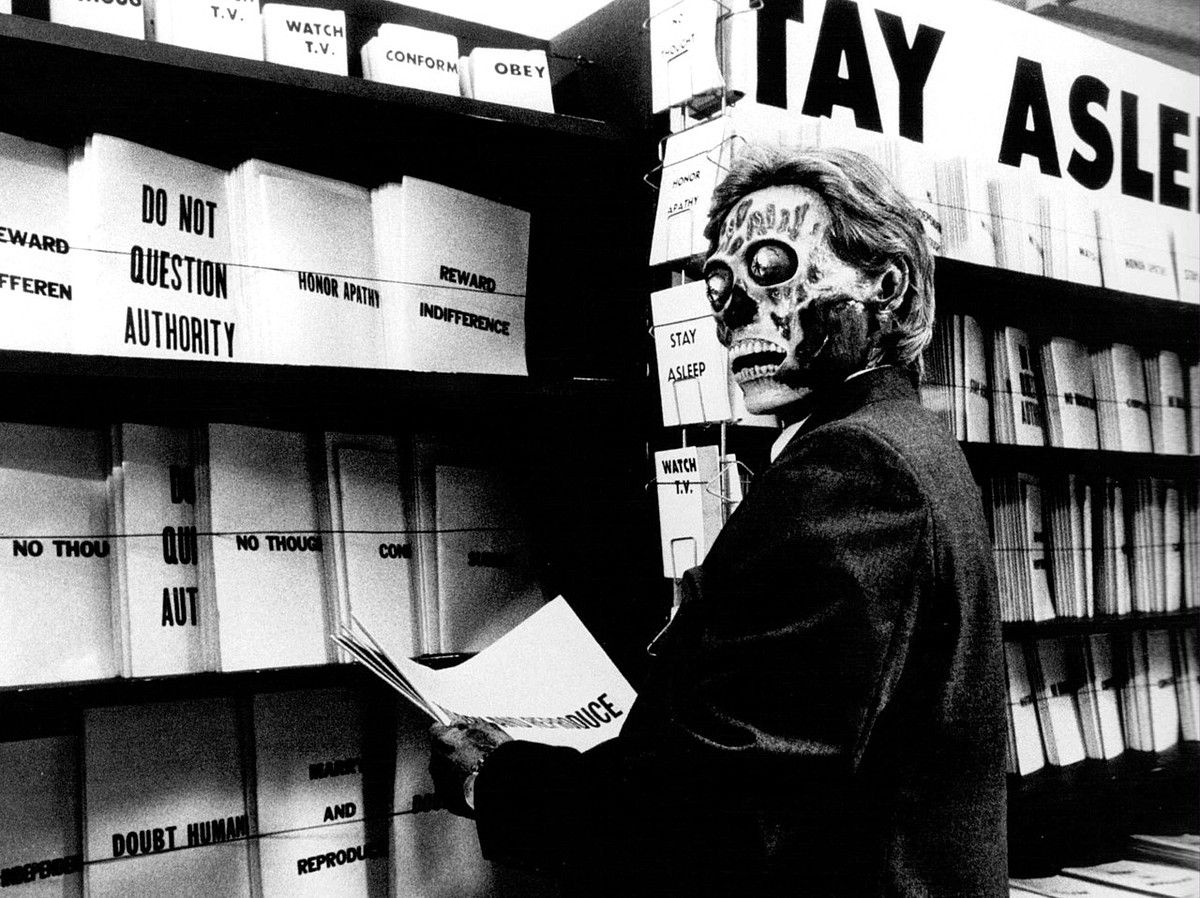 They Live —John Carpenter, 1988— pelikulatik hartutako irudia. BERRIA.