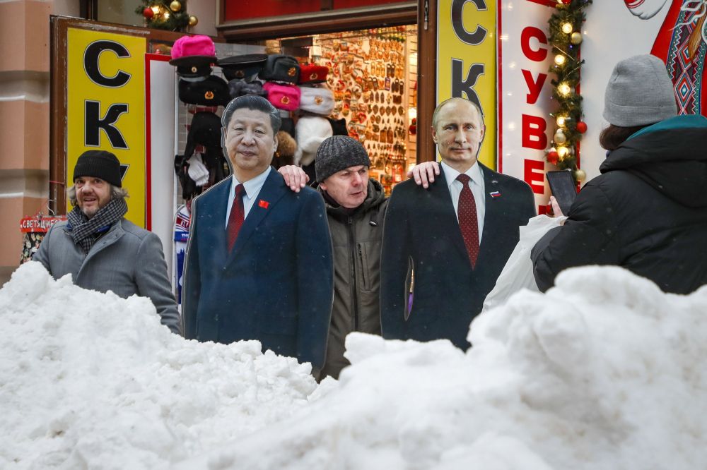 PUTIN. XI JINPING. PUTIN. XI JINPING.