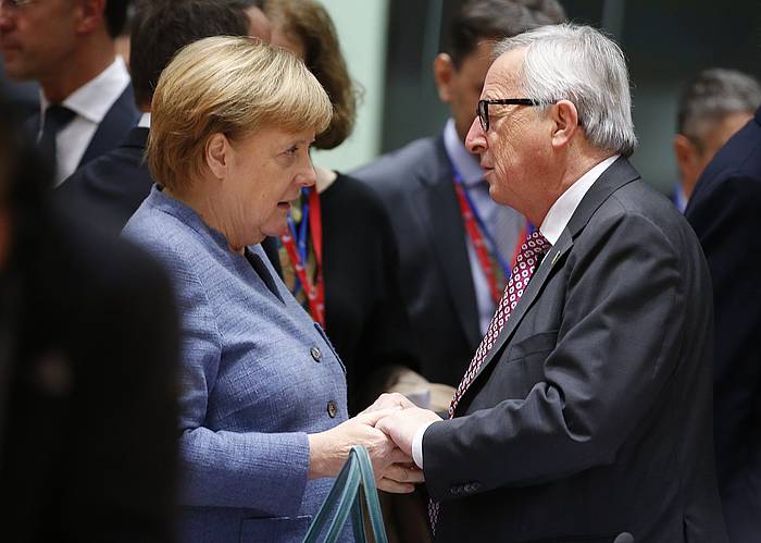 Angela Merkel Alemaniako kantzilerra eta Jean Calude Juncker Europako Batzordeko presidentea, Bruselan. JULIEN WARNAND, EFE