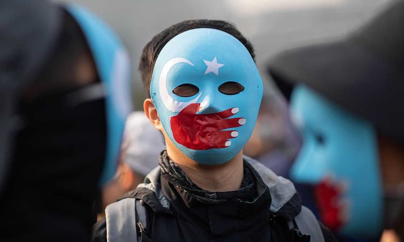 Uigurrek jasaten duten errepresioaren aurkako manifestazio bat, Hong Kongen, 2019ko abenduan. JEROME FAVRE / EFE.