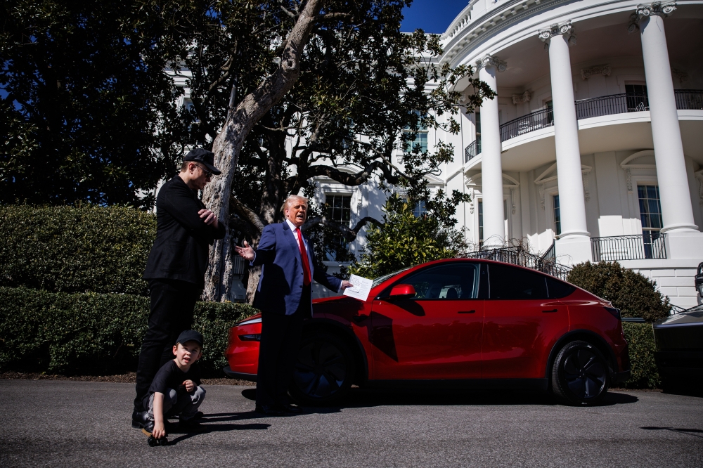TRUMP TESLA TRUMP TESLA