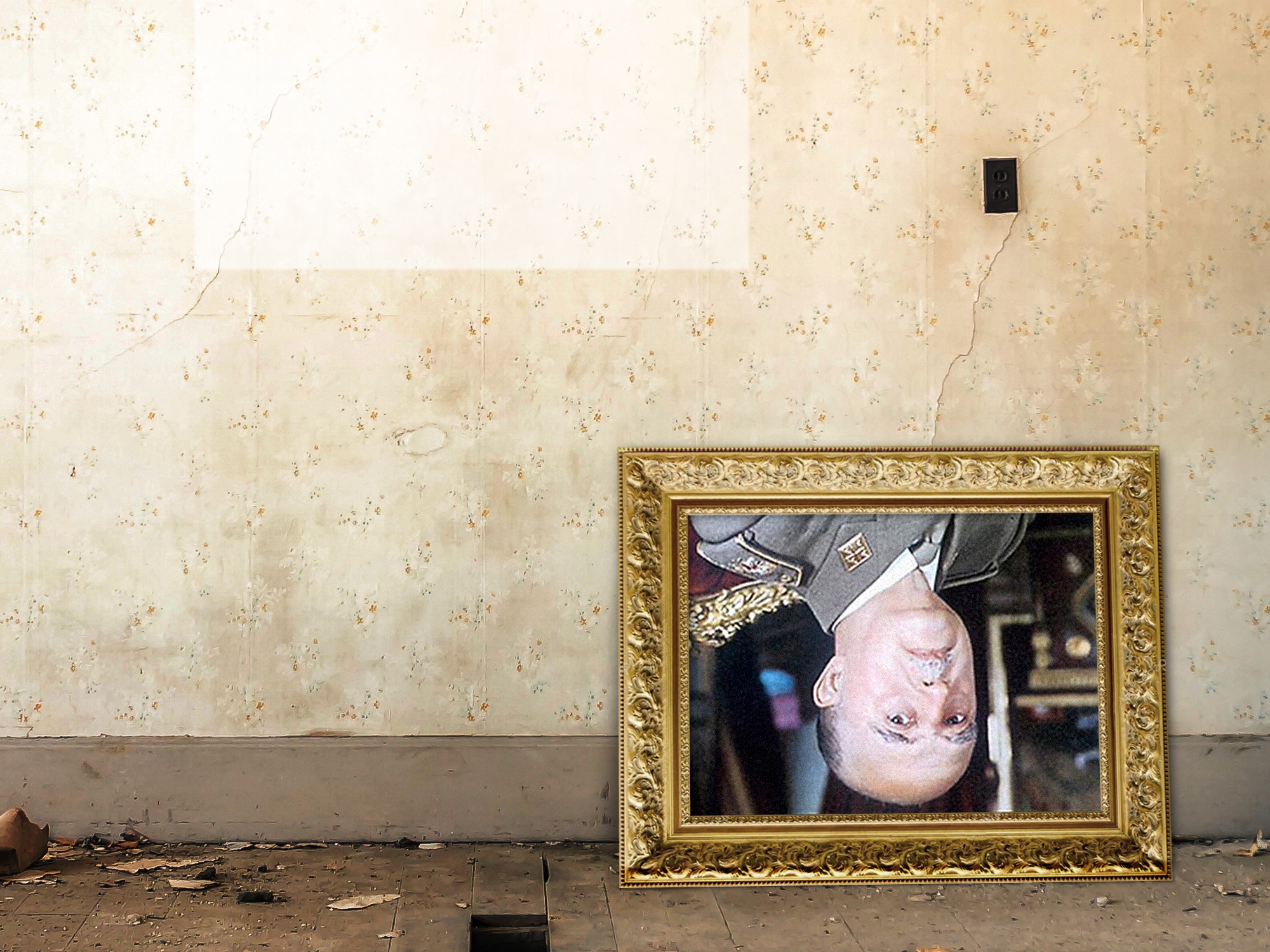 Francoren erretratu bat, buruz behera. BERRIA