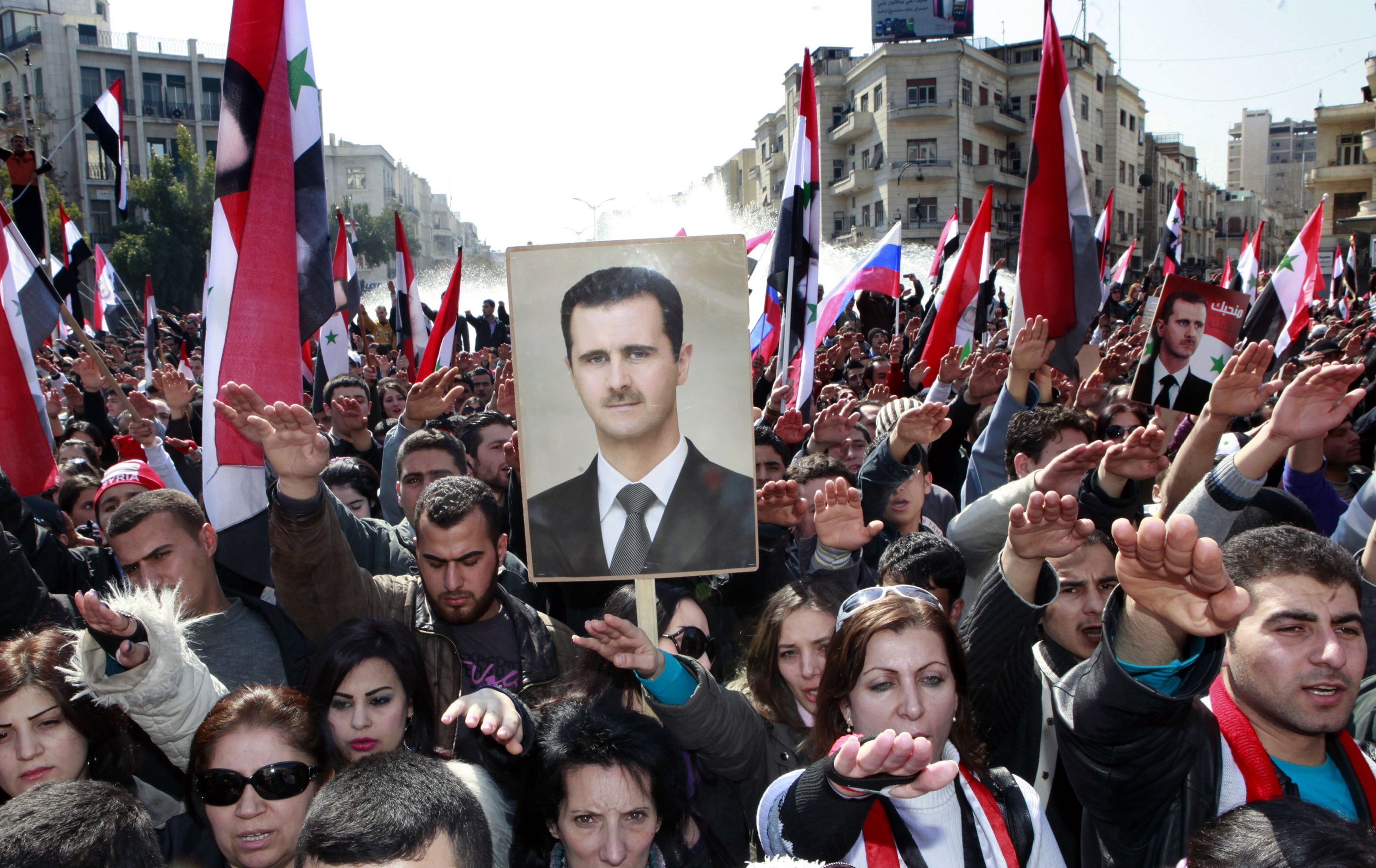 Bashar al-Assaden aldeko manifestazio bat otsailean, 2012an, Damasko hirian.  YOUSSEF BADAWI / EFE